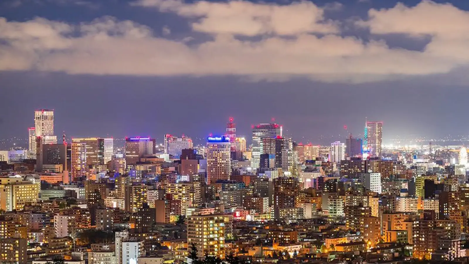 Sapporo skyline with mountains beyond the city