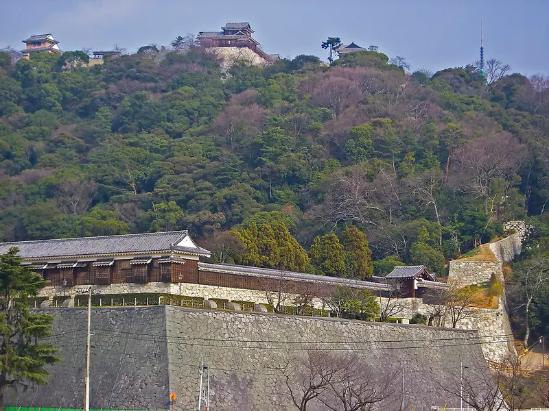 The hilltop keep of Matsuyama Castle overlooking the city in Ehime Prefecture