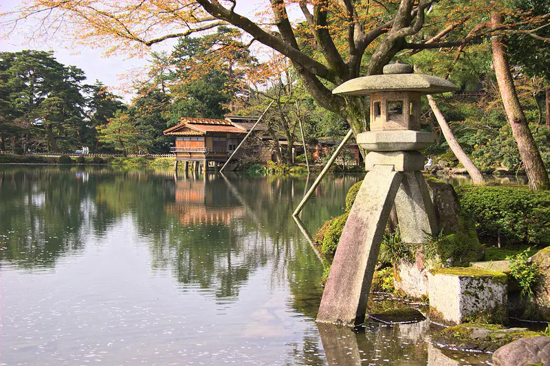 The Kotojitoro stone lantern beside the pond in Kenrokuen garden, Kanazawa, Ishikawa Prefecture