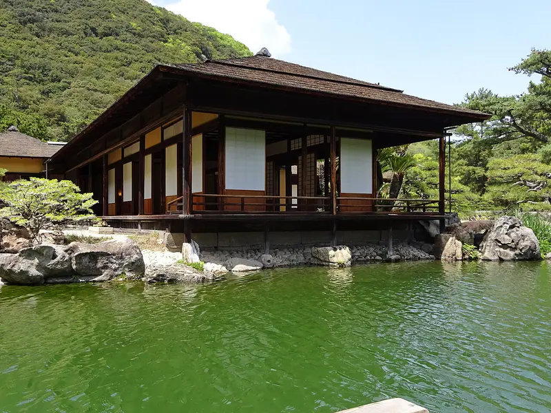 The Kikugetsu-tei teahouse beside a pond in Ritsurin Garden, Kagawa Prefecture