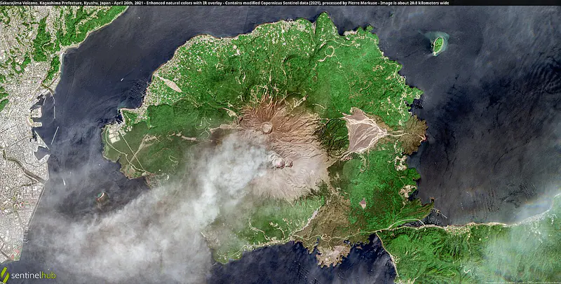 The active Sakurajima volcano rising across the bay in Kagoshima Prefecture