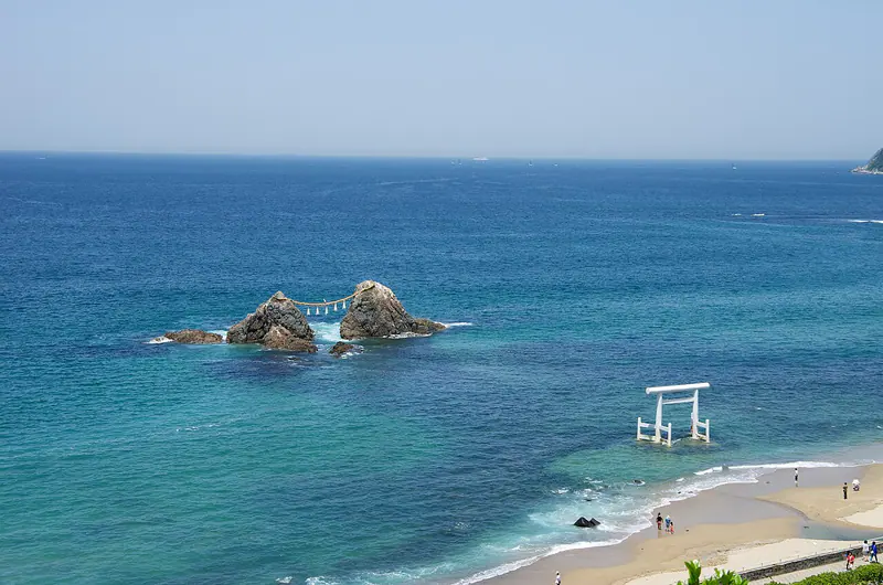 The white Futamigaura torii standing in the sea at Itoshima, Fukuoka