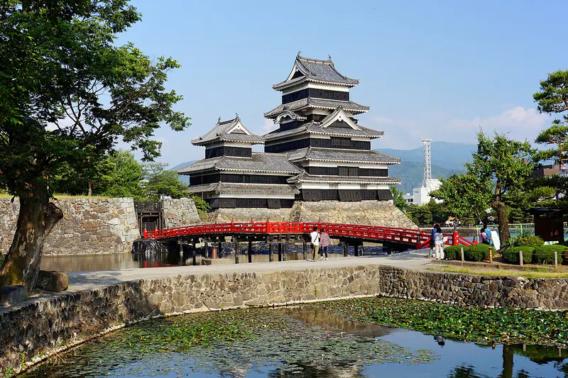 The black keep of Matsumoto Castle with mountains behind, Nagano