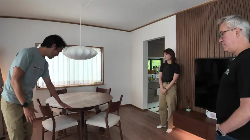 An AkiyaHub team member and local Japan coordinator inside a member’s renovated and furnished Japanese living room