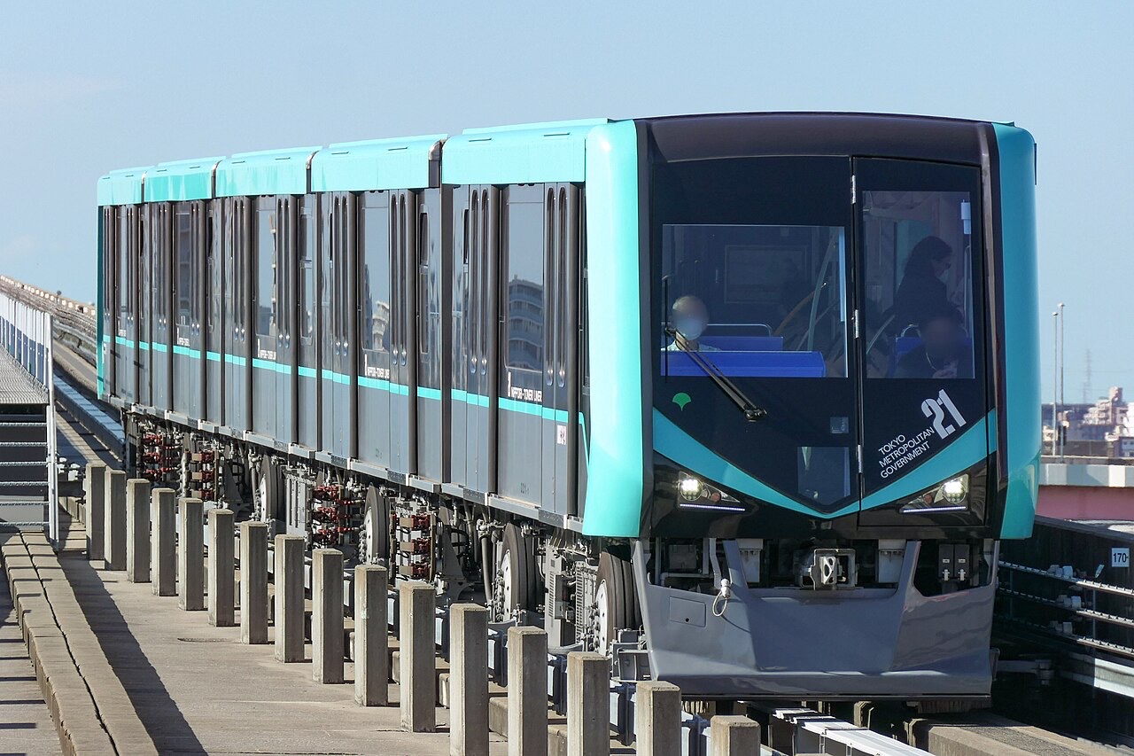 Nippori-Toneri Liner train arriving at an elevated platform