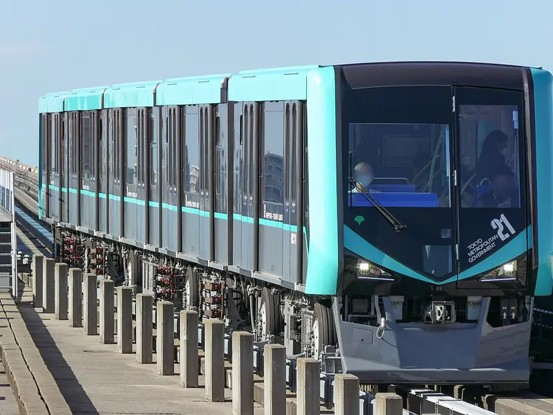 Nippori-Toneri Liner train arriving at an elevated platform