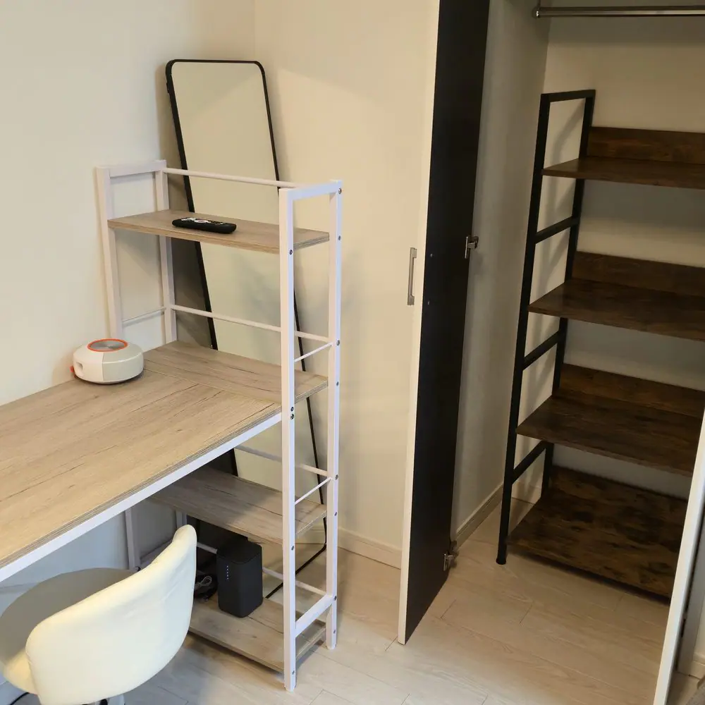 Desk, storage, and closet inside JT Terrace House #101